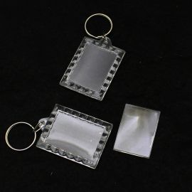 Chaveiro em Acrílico /  66x39mm - para Foto 3x4cm - Com Detalhe  (unidade) - Transparente.