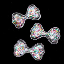Aplique de Plástico / 6x3,6cm - Laço com Estrelinhas de Paetê (unidade)
