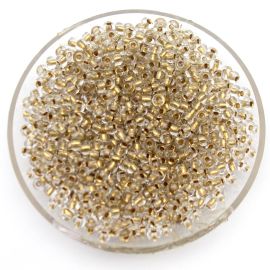 Miçangão Preciosa (6/0) / Transparente com o Miolo Dourado (10 gramas)