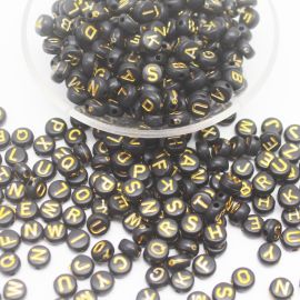 Conta Plástica Leitosa Preta / 6mm - Letras Diversas (20 gramas) - Dourado